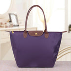 Sac bandoulière femme en trois formats, huit coloris, violet