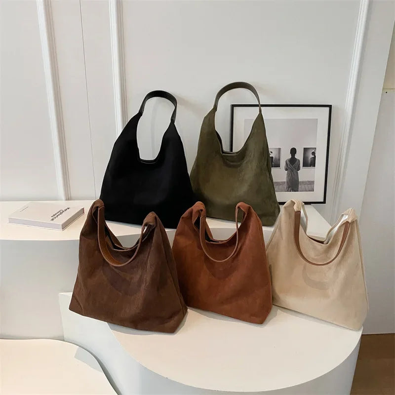 Sac besace femme en suédine, forme trapèze, cinq coloris