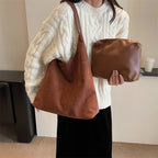Sac besace femme en suédine, forme trapèze, cinq coloris