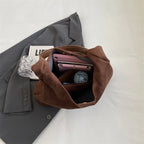Sac besace femme en suédine, forme trapèze, cinq coloris
