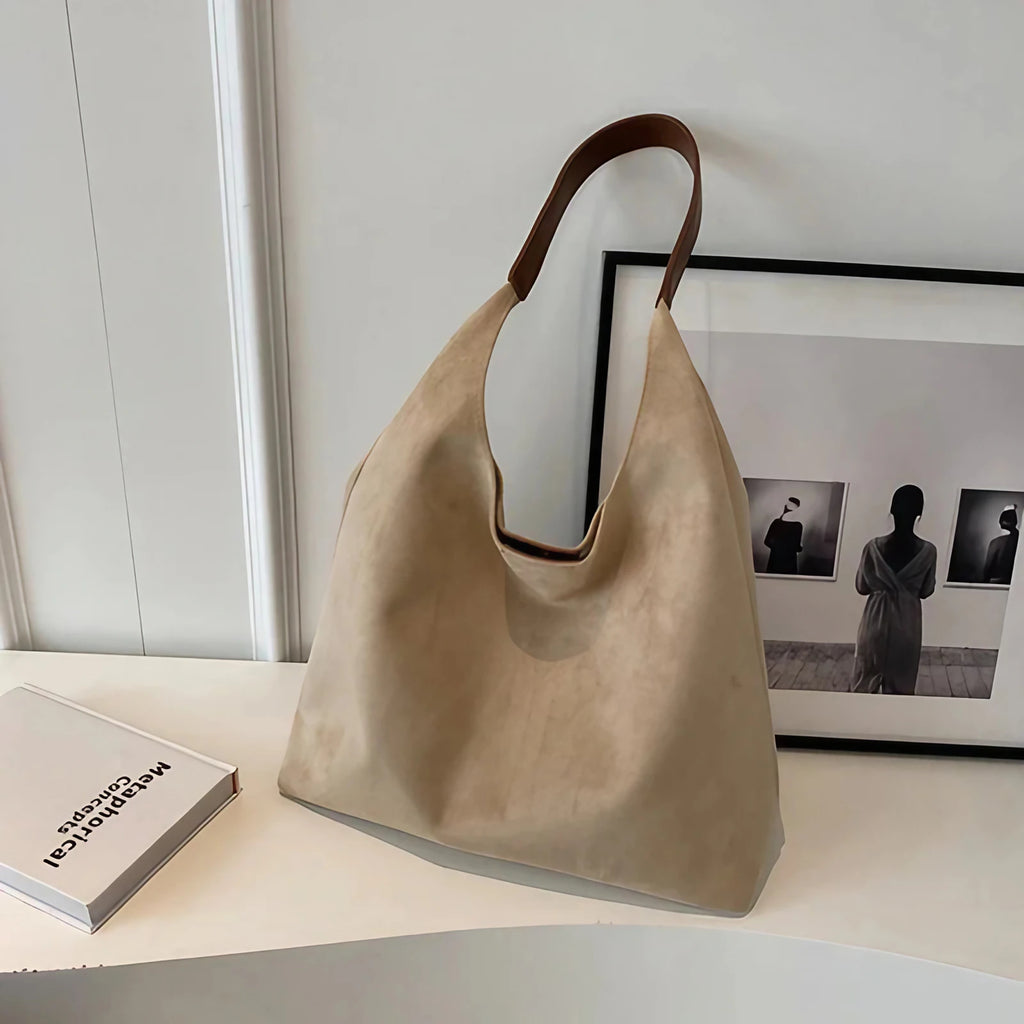 Sac besace femme en suédine, forme trapèze, cinq coloris, beige