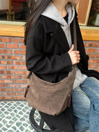 Sac besace femme en faux daim, forme demi-lune