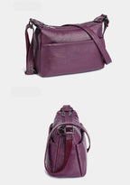 Sac besace femme à texture grainée, deux compartiments zippés