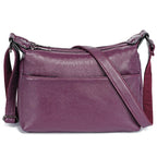 Sac besace femme à texture grainée, deux compartiments zippés, violet