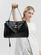 Sac cabas femme à rabat et boucle, finition métal doré ou argenté