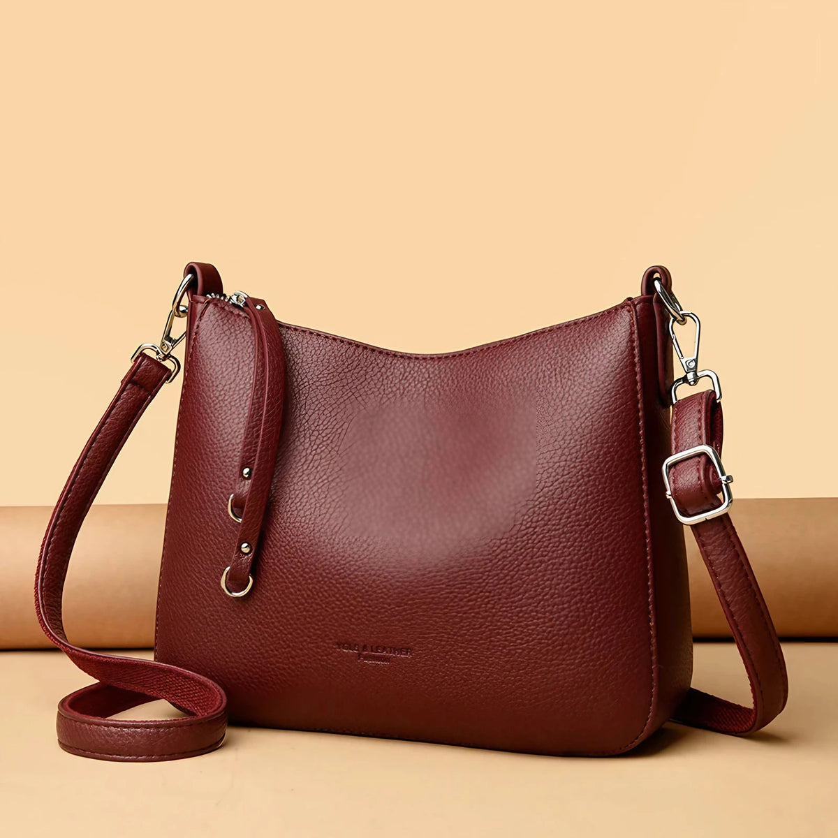 Sac bandoulière femme en similicuir grainé, anse amovible, bordeaux