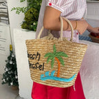 Sac en paille brodé femme, motifs fruits et plage, à cordon
