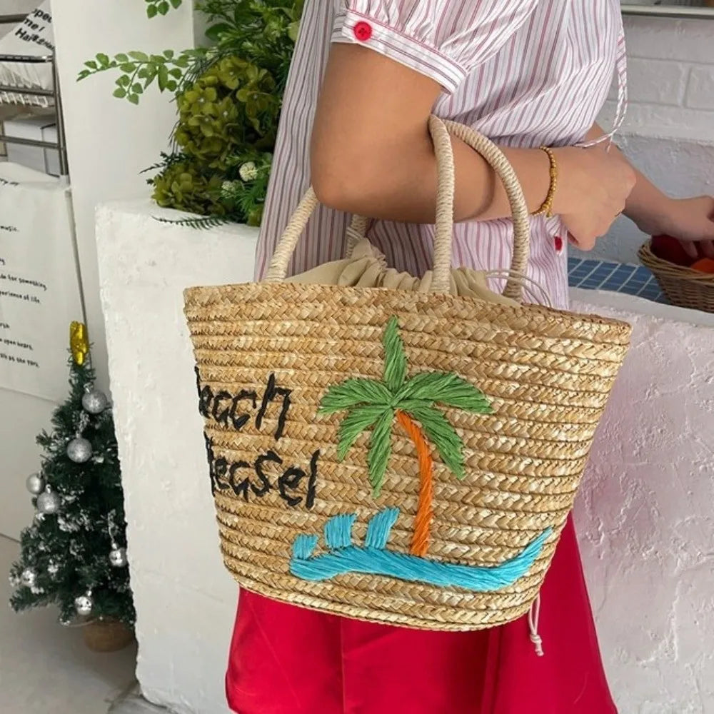 Sac en paille brodé femme, motifs fruits et plage, à cordon