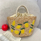 Sac en paille brodé femme, motifs fruits et plage, à cordon