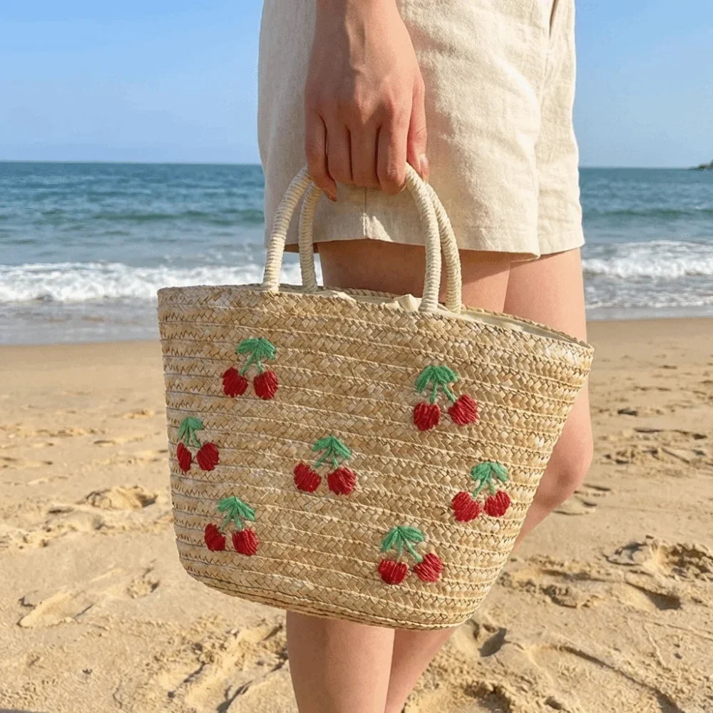 Sac en paille brodé femme, motifs fruits et plage, à cordon