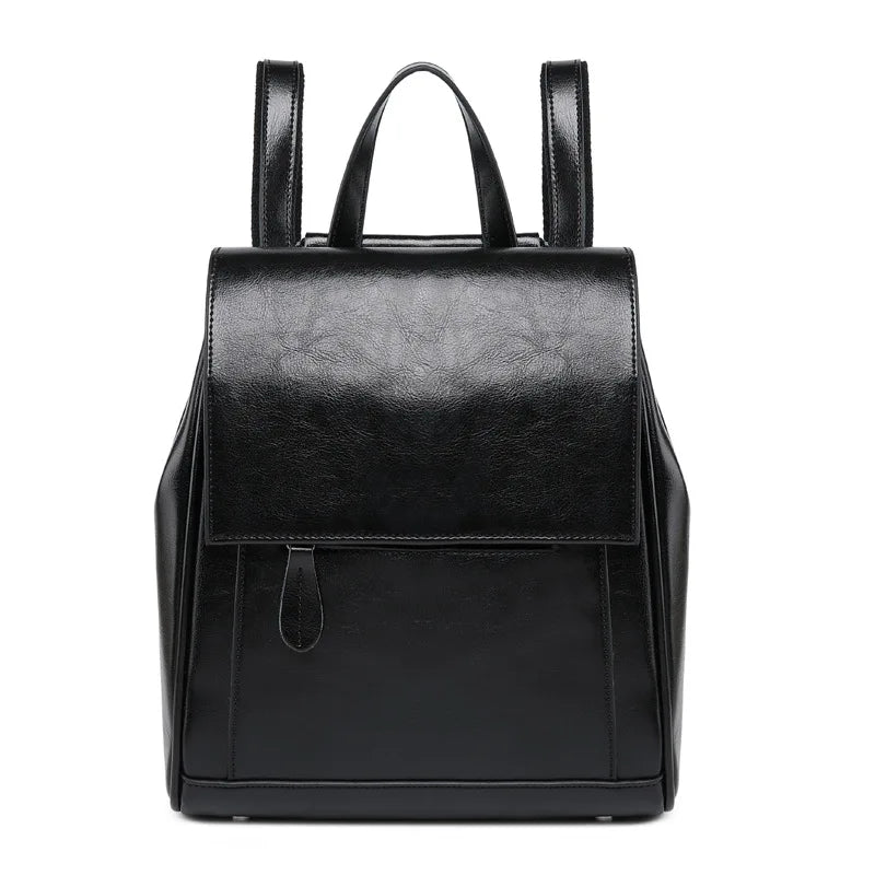 Petit sac à dos femme en similicuir lisse, à rabat