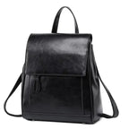 Petit sac à dos femme en similicuir lisse, à rabat, noir