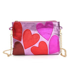 Sac métallisé effet miroir à cœurs, chaîne dorée amovible, rose