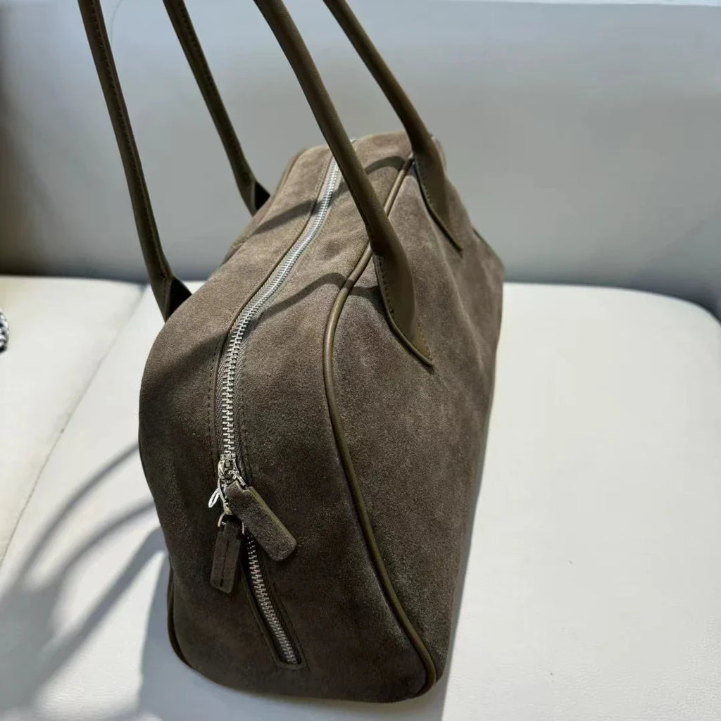 Sac porté épaule femme de forme allongée, quatre coloris