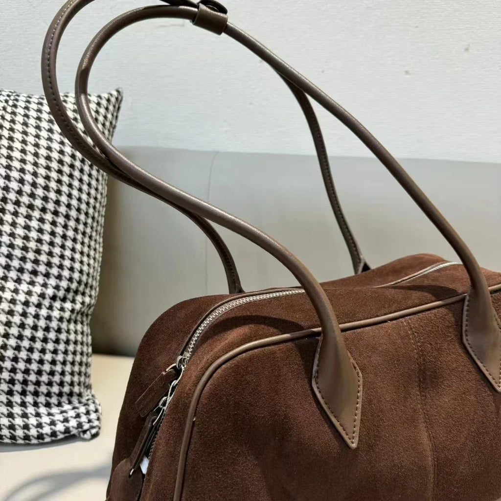 Sac porté épaule femme de forme allongée, quatre coloris