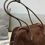 Sac porté épaule femme de forme allongée, quatre coloris