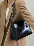 Sac besace femme noir à fermoir doré, 26 x 17 cm, noir