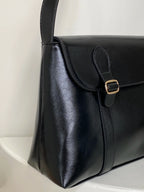 Sac besace femme noir à fermoir doré, 26 x 17 cm