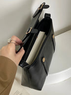 Sac besace femme noir à fermoir doré, 26 x 17 cm
