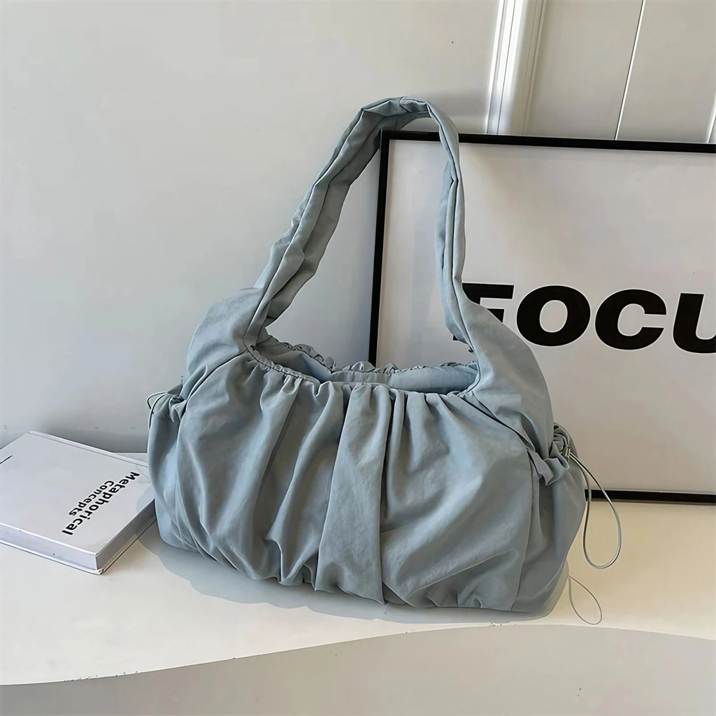 Sac porté épaule femme en nylon, devant froncé, poches à cordon, bleu