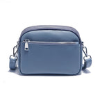 Sac à main femme en cuir forme enveloppe, six coloris, bleu