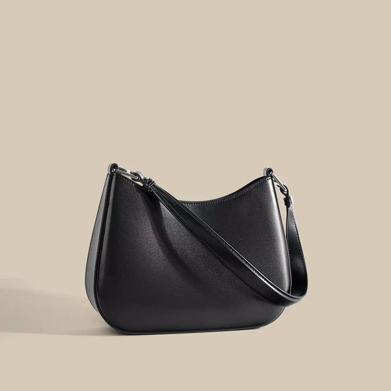 Sac à main femme noir compact, bandoulière ajustable