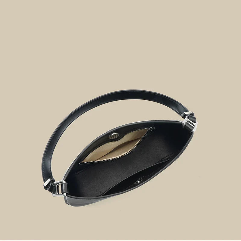 Sac à main femme noir compact, bandoulière ajustable