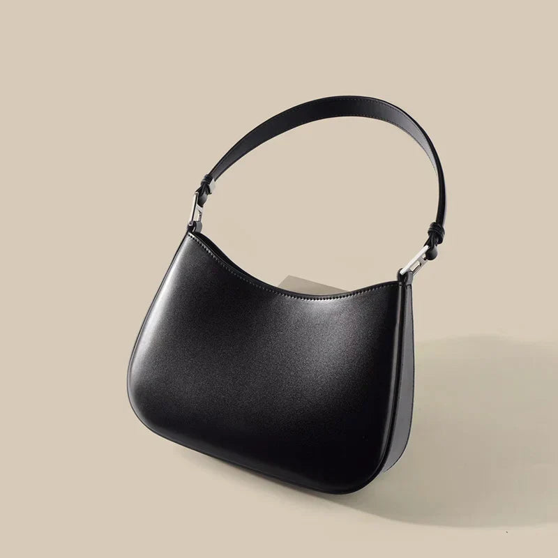 Sac à main femme noir compact, bandoulière ajustable