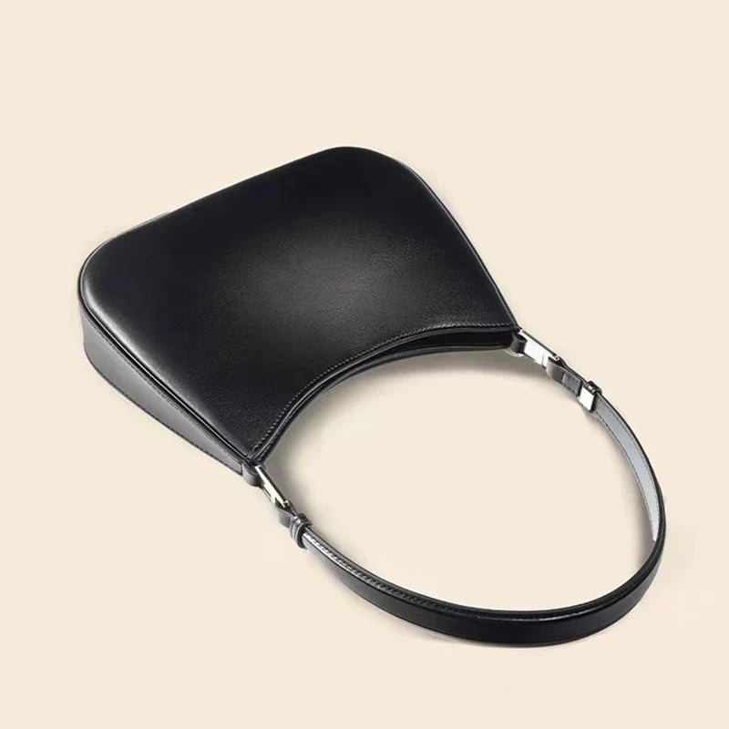 Sac à main femme noir compact, bandoulière ajustable