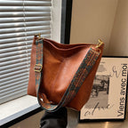 Sac seau allongé femme en similicuir, bandoulière en tissu à motifs