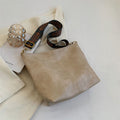 Sac seau allongé femme en similicuir, bandoulière en tissu à motifs, beige