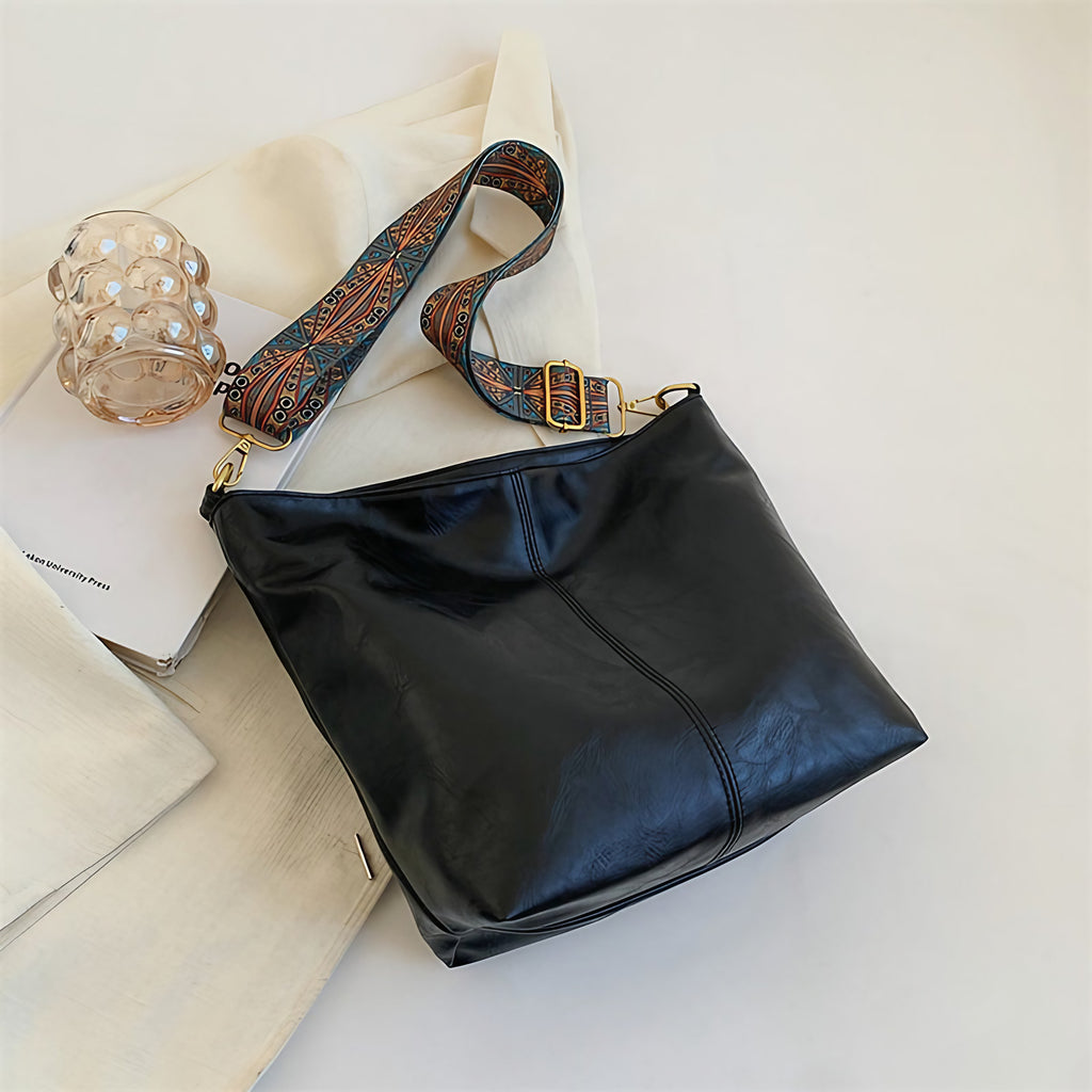 Sac seau allongé femme en similicuir, bandoulière en tissu à motifs, noir