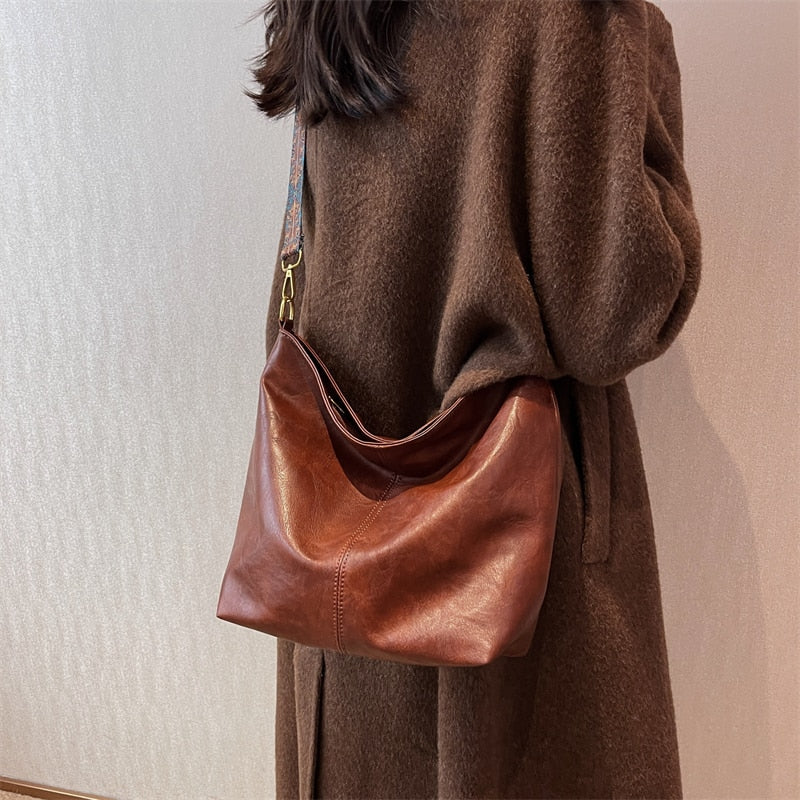 Sac seau allongé femme en similicuir, bandoulière en tissu à motifs