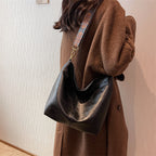 Sac seau allongé femme en similicuir, bandoulière en tissu à motifs