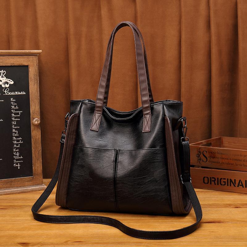 Sac à main femme noir à finitions marron, bandoulière amovible