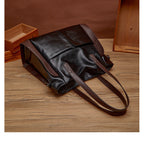 Sac à main femme noir à finitions marron, bandoulière amovible
