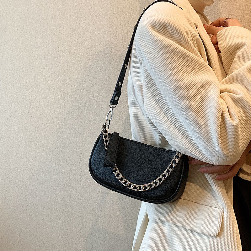 Sac à main noir femme à chaîne argentée, fermeture zip