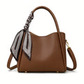 Sac seau femme marron en similicuir, forme triangulaire