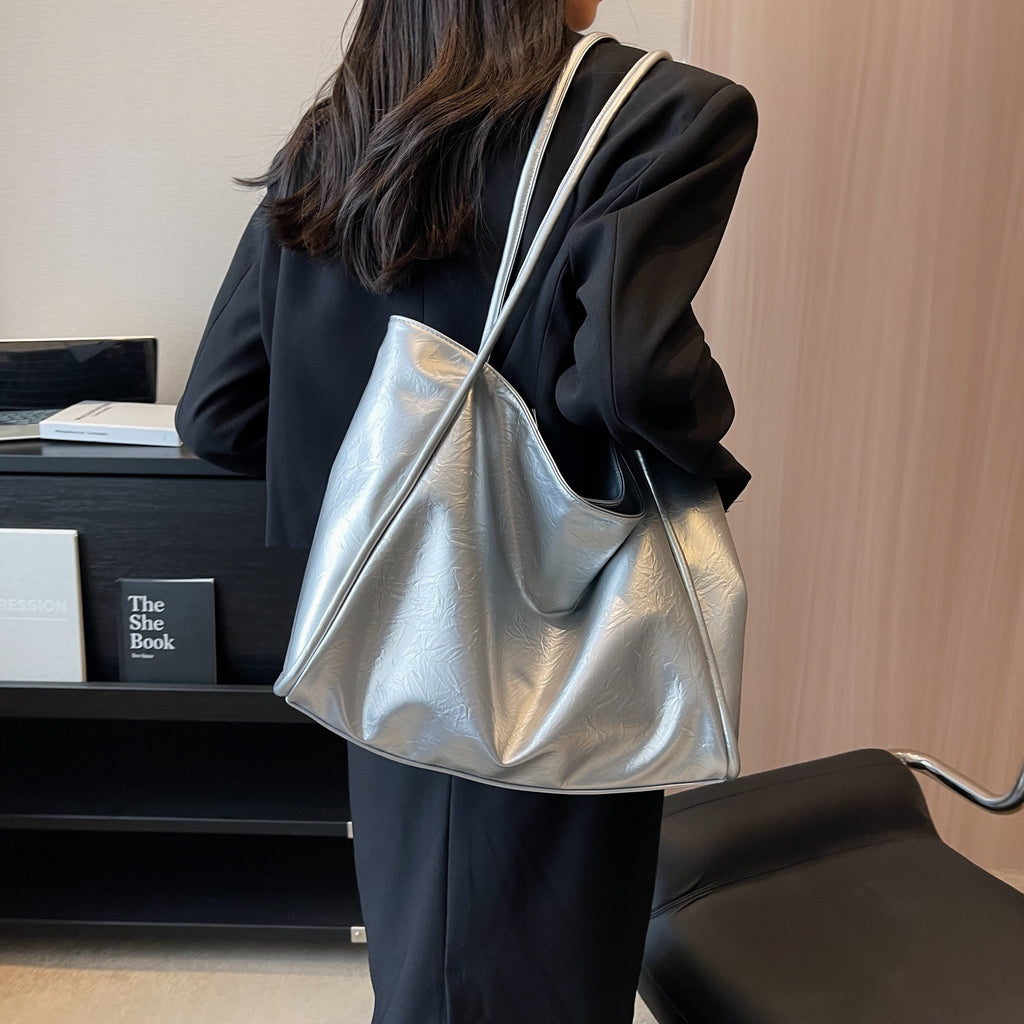 Grand sac à main argenté femme en cuir, forme évasée