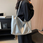 Grand sac à main argenté femme en cuir, forme évasée