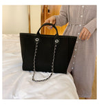 Sac à main trapèze noir femme à chaîne, 31 x 28 cm