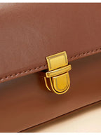 Sac porté épaule femme forme enveloppe, loquet doré