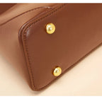 Sac porté épaule femme forme enveloppe, loquet doré