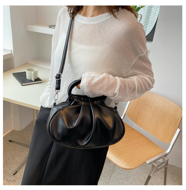 Sac boule noir femme à anses rondes, sangle amovible