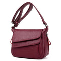 Sac besace femme souple en similicuir à rabat, sept coloris, bordeaux