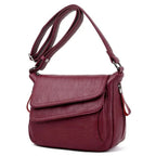 Sac besace femme souple en similicuir à rabat, sept coloris, bordeaux