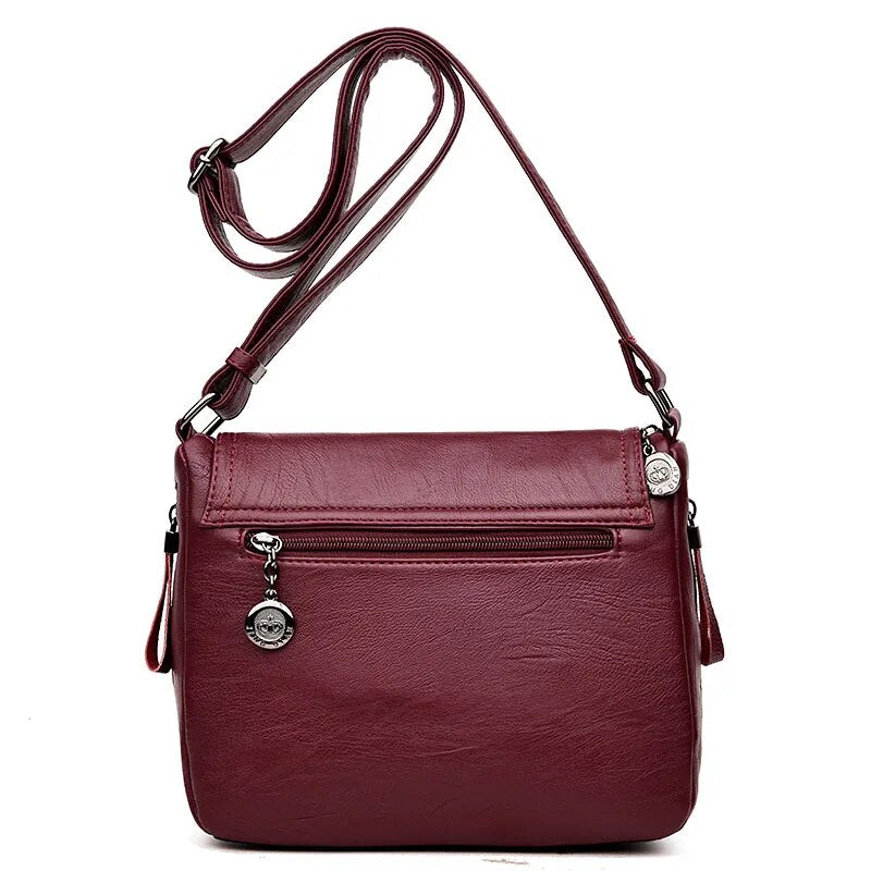 Sac besace femme souple en similicuir à rabat, sept coloris