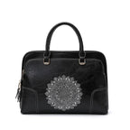 Sac ordinateur femme en cuir, porté main ou bandoulière, noir