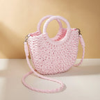 Sac en osier demi-lune femme, anses rigides et bandoulière, rose pâle