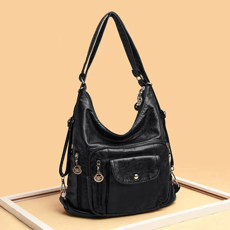 Sac porté épaule femme en cuir souple, multipoches, zippé